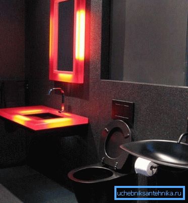 Černé WC na toaletu, které je vyzdobeno ve stylu hi-tech