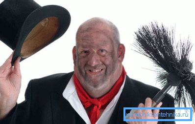 Photo chimney sweep with brush. Photo chimney sweep with brush.