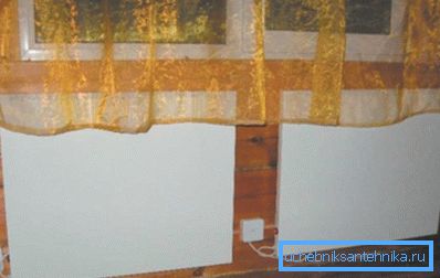 Amatérské foto, elektrické ohřívače, vyrobené ve formě panelů s keramickými vložkami